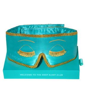 Turquoise drowsy sleep mask on turquoise drowsy sleep mask boxed; Silk Sleep Mask blocks out 100% of light, while the heavenly padded lining cushions the eyes and muffles sound, which helps to promote a deeper and better quality of sleep.