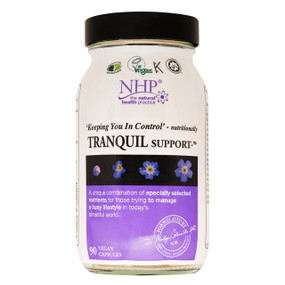 Natural Health Practice Tranquil Woman Support - 90-Capsules glass bottle with purple and black label and black liaimed at helping women cope both mentally and physically with the stresses and strains of everyday life