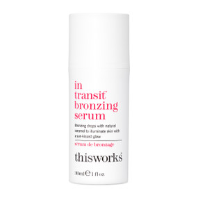 This Works In Transit Bronzing Serum 30ml - white plastic tube; bronzing drops with natural caramel to illuminate skin with a sun kissed glow